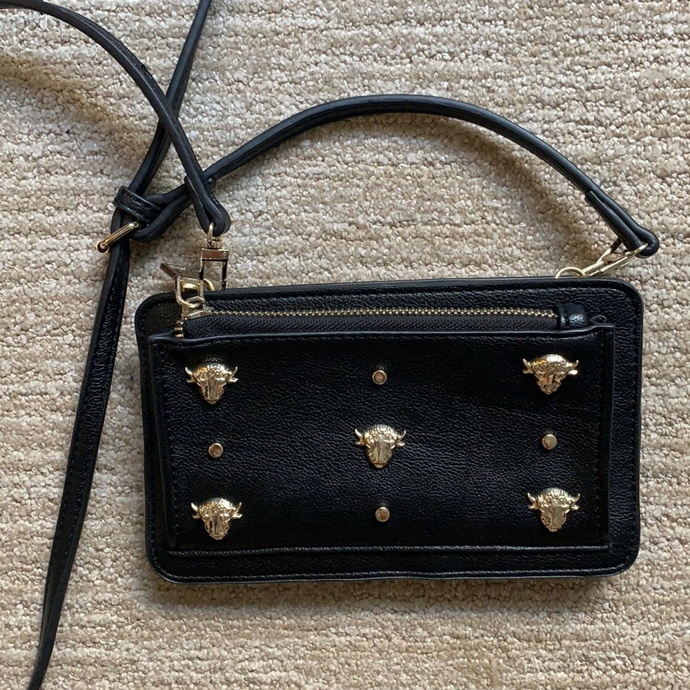 This is a bag / wallet from Zara. Very useful